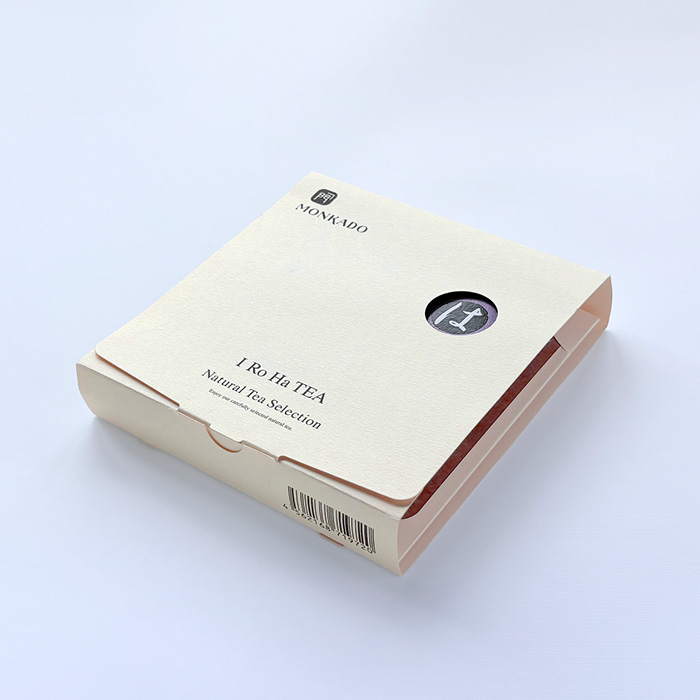 丸窓からラベルの文字が覗く、門嘉堂いろはTEA用の蛇腹ファイリングBOX(外観)